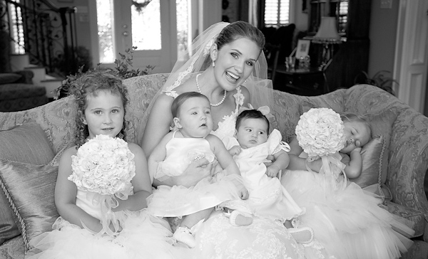 the bride sitting with adorable kids - photo by Houston based wedding photographer Adam Nyholt